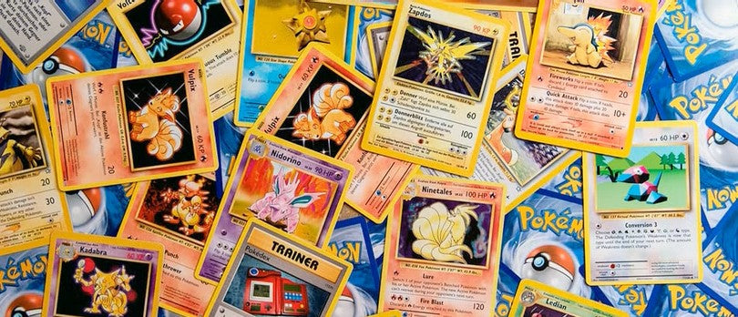A pile of Pokémon cards showcasing the importance of TCG collection protection for keeping cards safe and in great condition