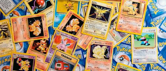 A pile of Pokémon cards showcasing the importance of TCG collection protection for keeping cards safe and in great condition